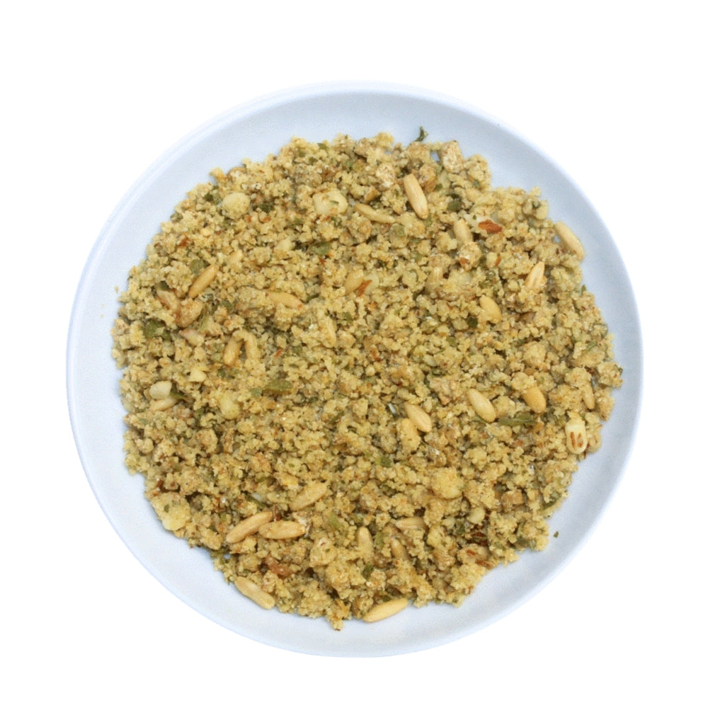 Dry mix of parrot food on a white plate